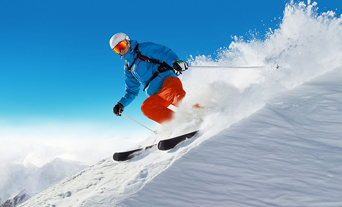 person skiing in deep snow